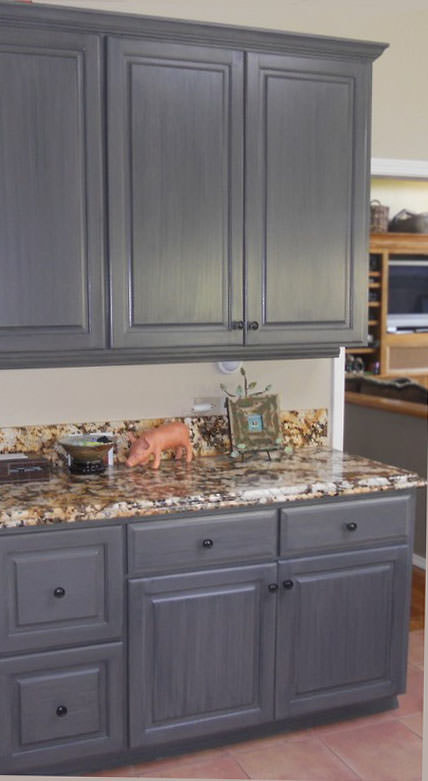Thompson Art Studios applied a Grey Striae finish to kitchen cabinets in a transitional kitchen. 