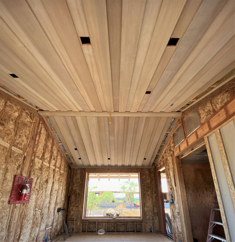 Thompson Art Studios finishes wood ceiling beams in our studio prior to installation at this custom-build property. 
