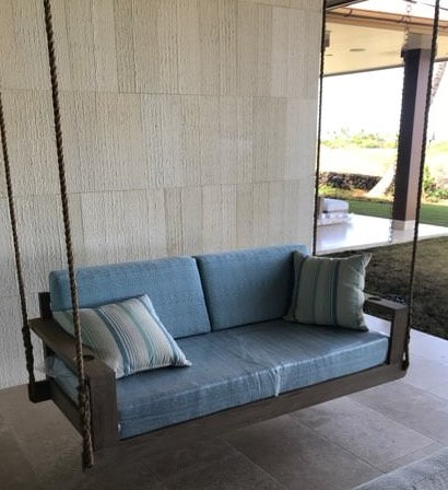 Thompson Art Studios gives a lanai teak swing a WOCA finish in a distressed driftwood finish.